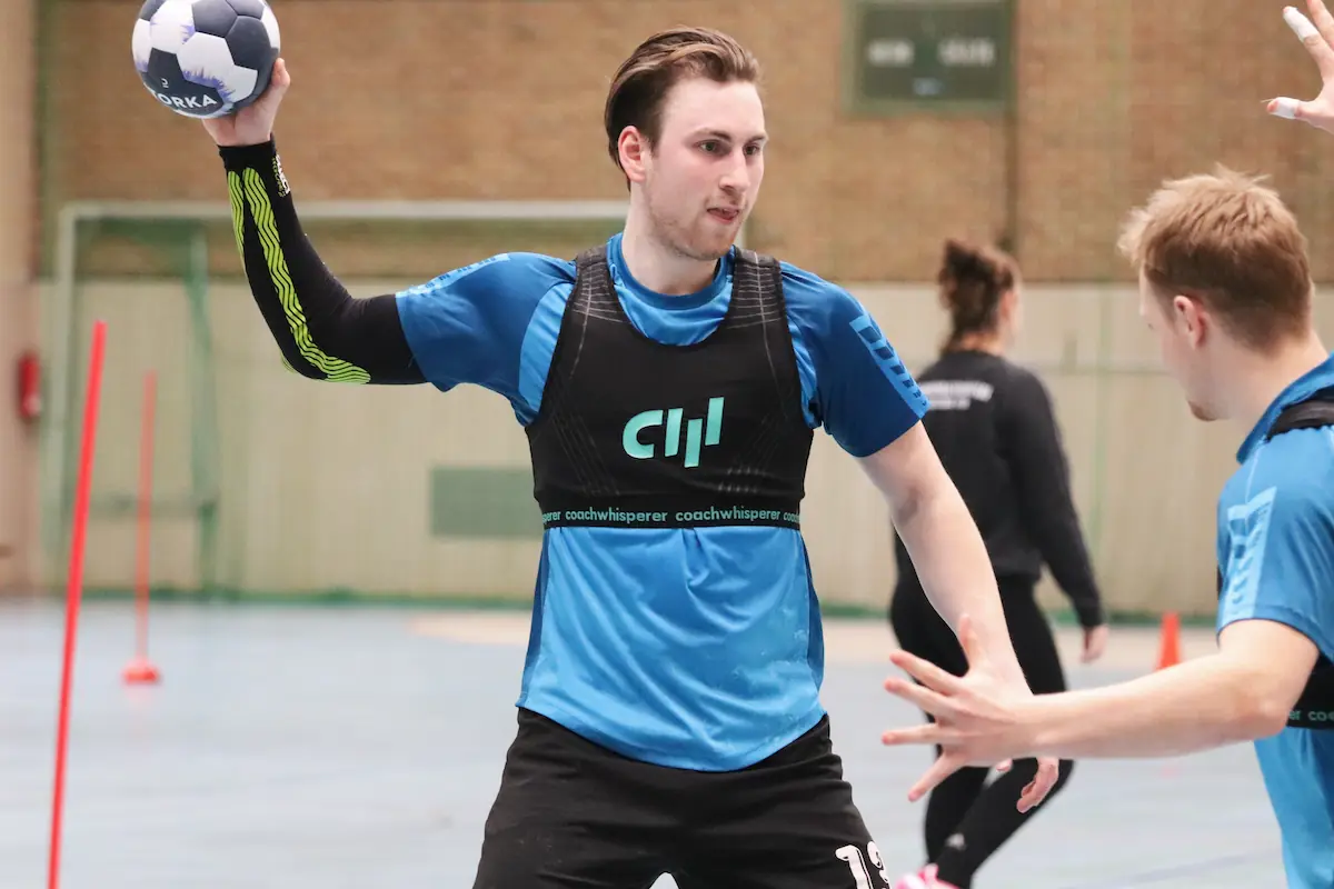Handball players wearing the Soundstar while training with the Coachwhisperer system