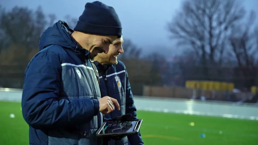 FC Carl Zeiss Jena coaches overseeing the training while using the Coachwhisperer